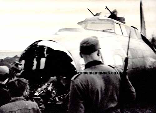 German guarding downed plane